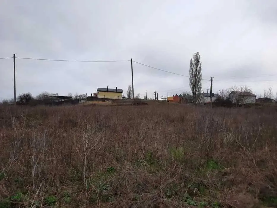 Участок в городе с выходом к пруду! 