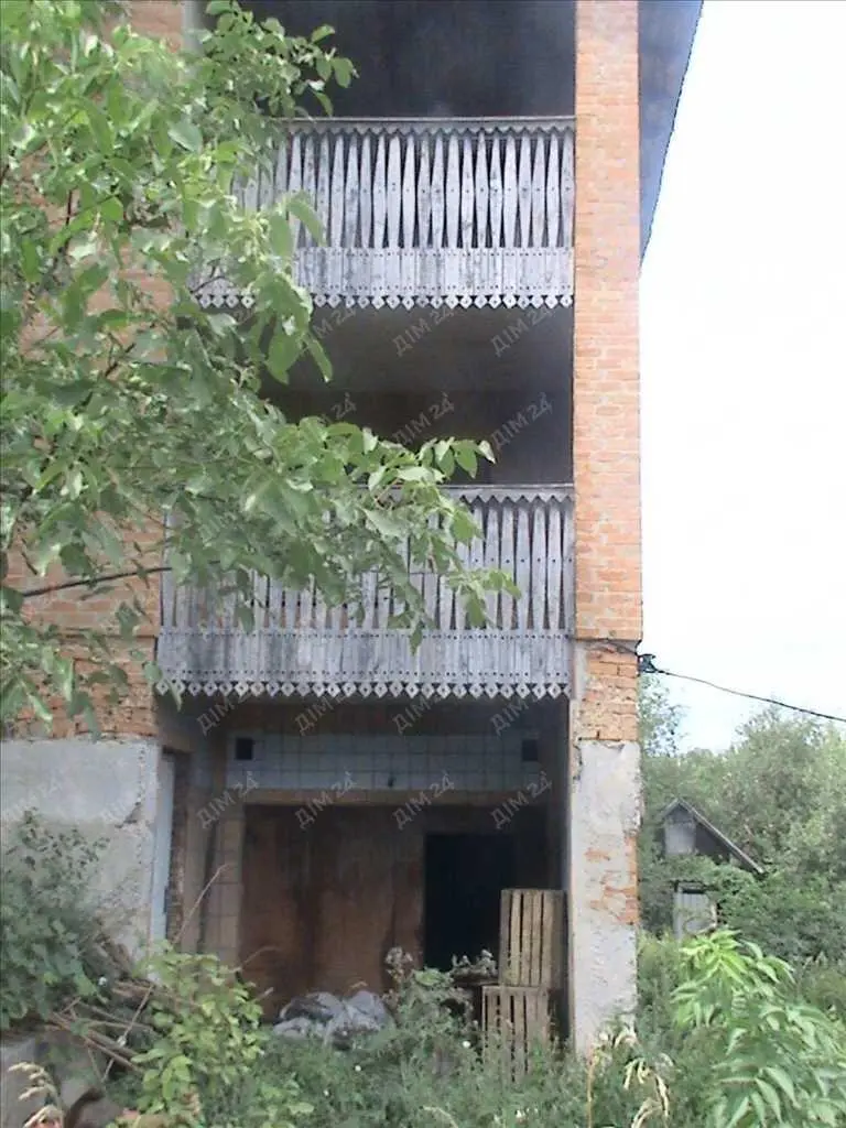 Ділянка з будинком в с.Коломак за Абазівкою.