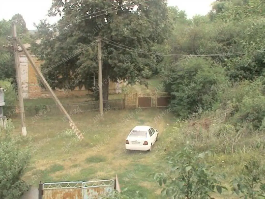 Ділянка з будинком в с.Коломак за Абазівкою.