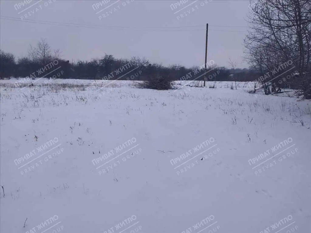 Ділянка з будинком під знос