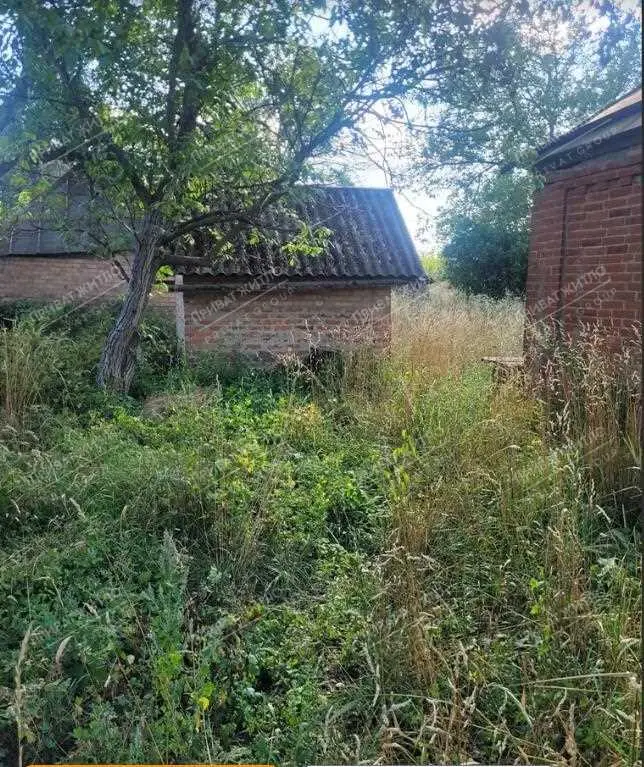 Ділянка з будинком під знос