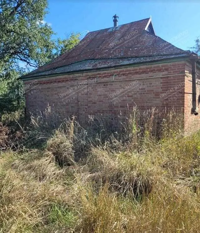 Ділянка з будинком під знос