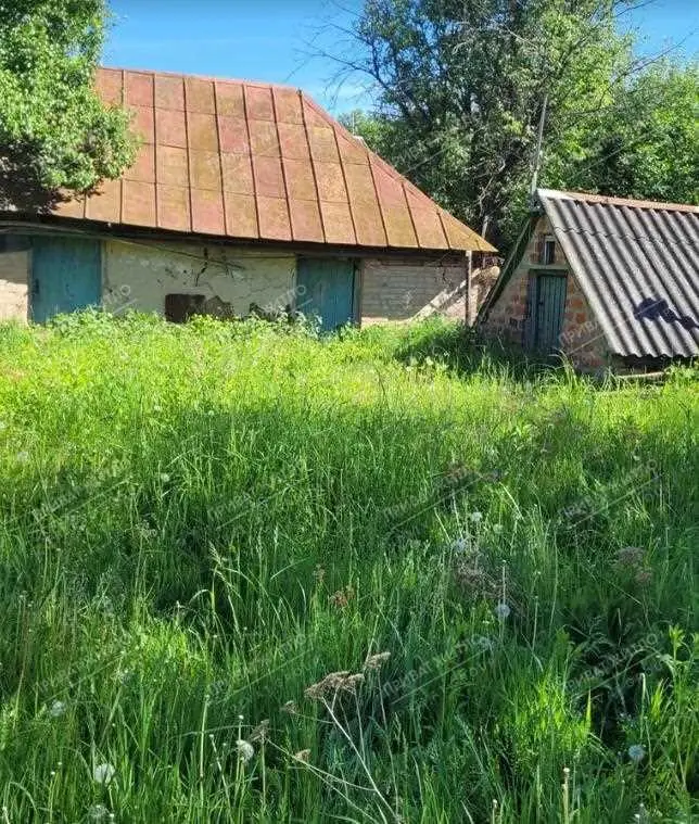 Ділянка з будинком під знос