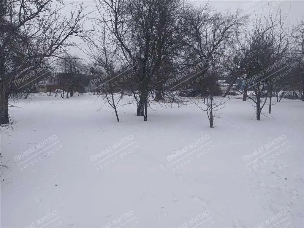 Ділянка з будинком під знос