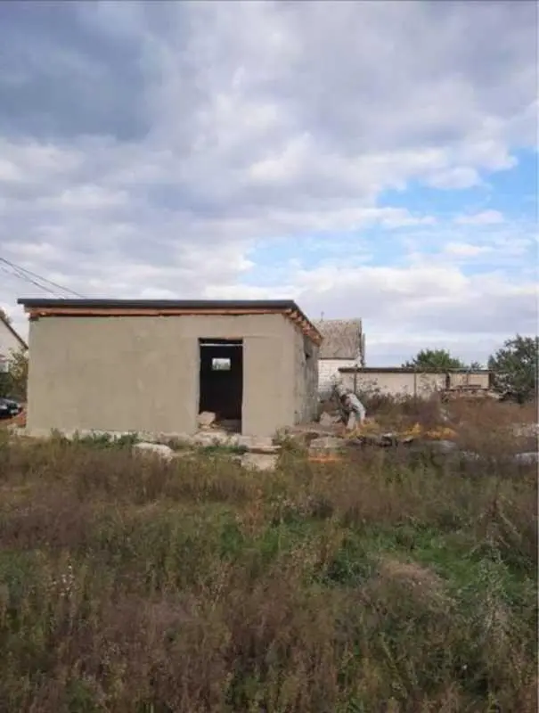 Земельна ділянка з проектом на будівництво житлового будинку