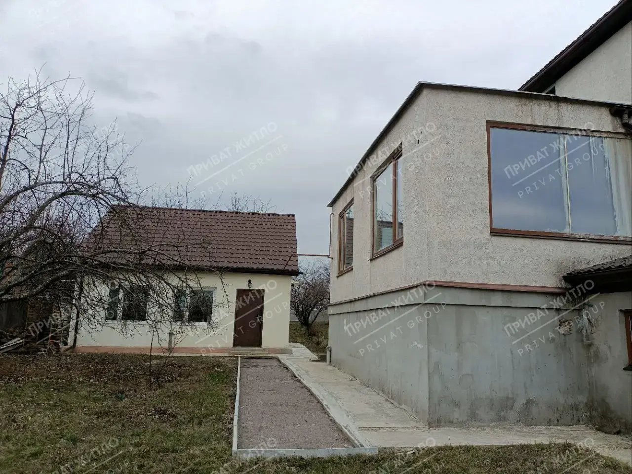 Два будинки на одній ділянці, с. Мачухи