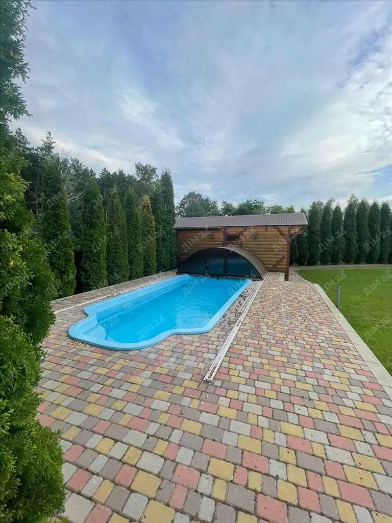 Унікальний будинок із зрубу в передмісті Полтави (Клюшники)