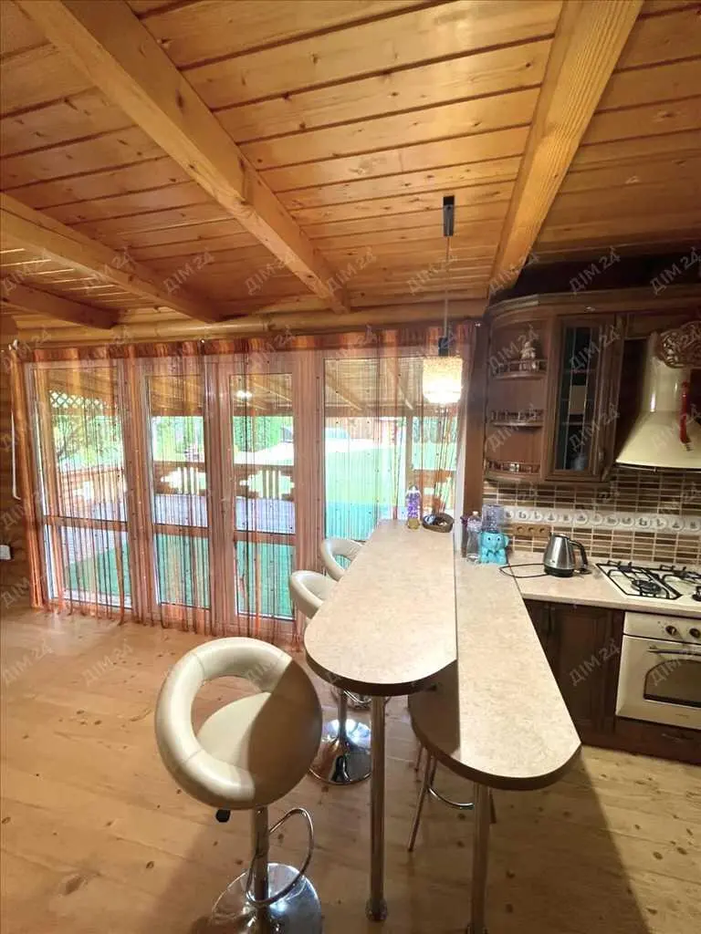 Унікальний будинок із зрубу в передмісті Полтави (Клюшники)