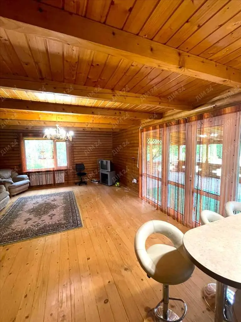 Унікальний будинок із зрубу в передмісті Полтави (Клюшники)