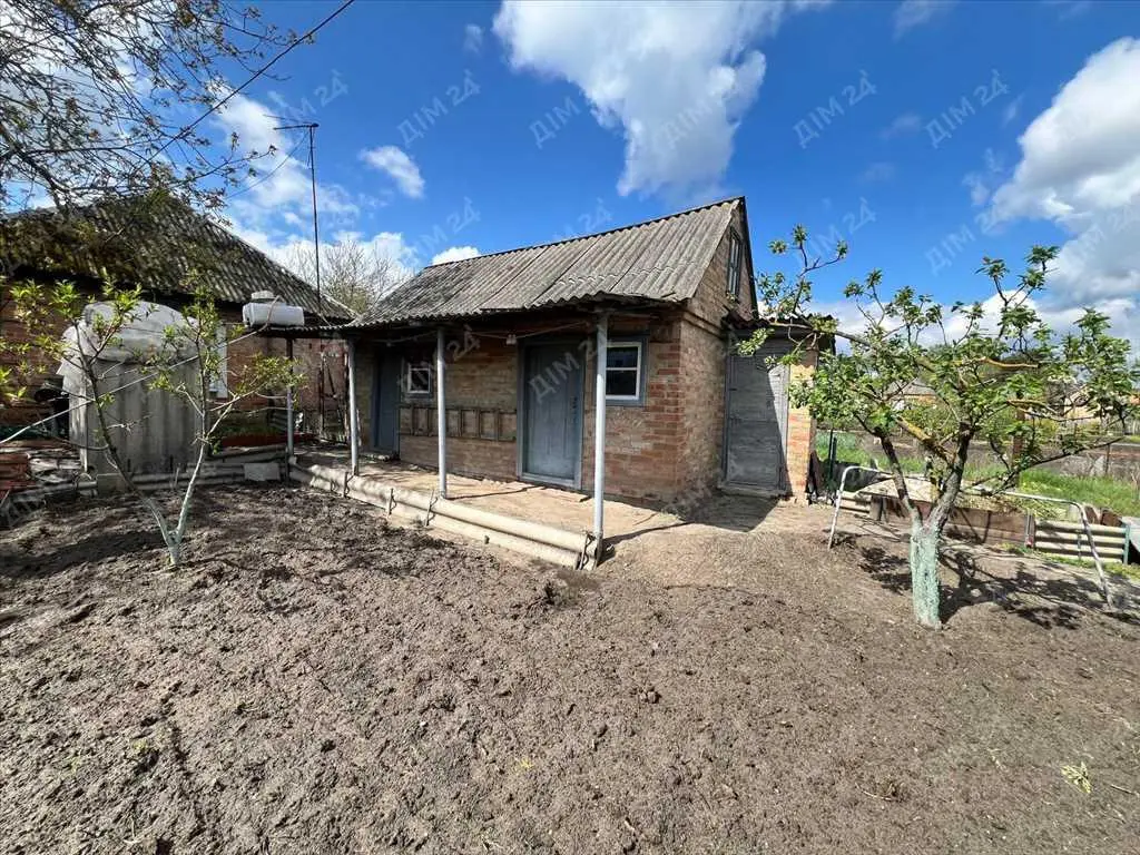 Продаж ділянки з будинком