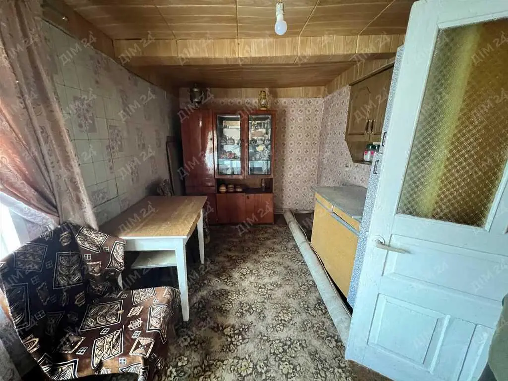 Продаж ділянки з будинком