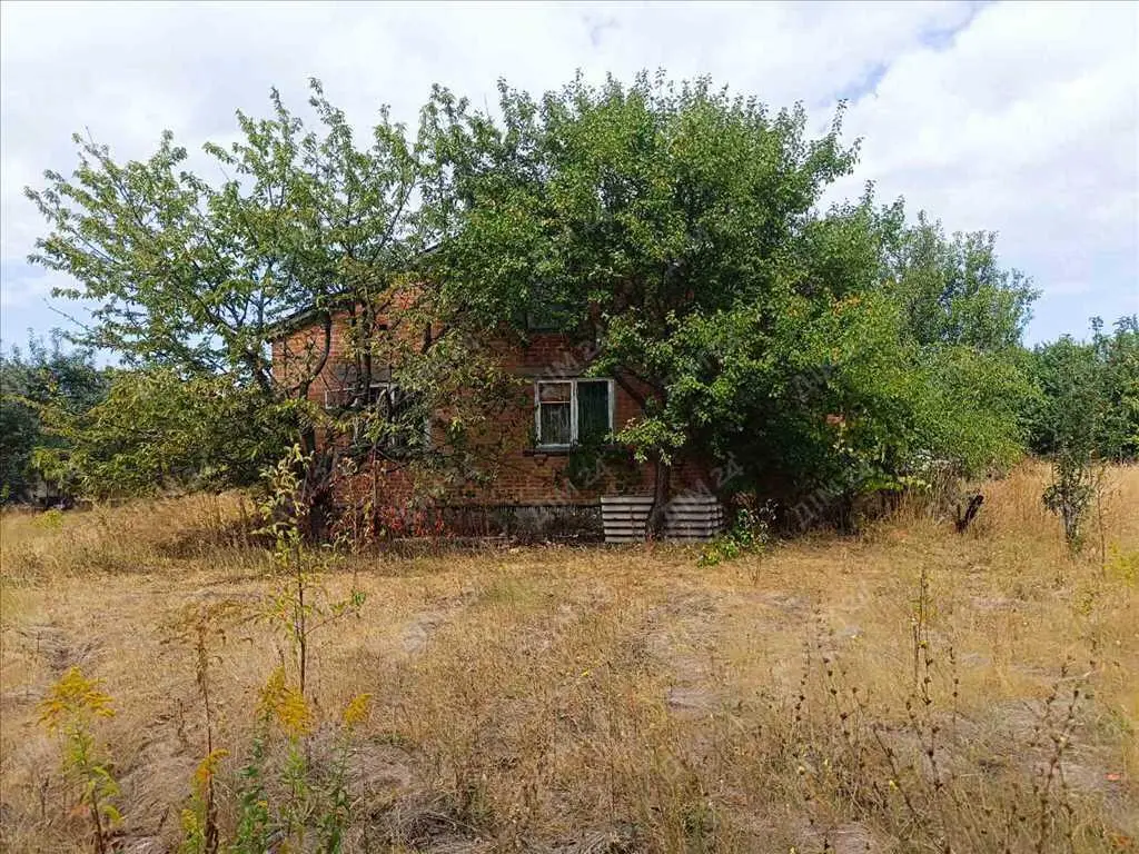 Цегляний будинок в Верхолах