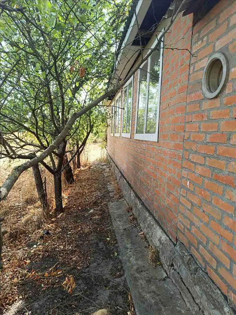 Цегляний будинок в Верхолах