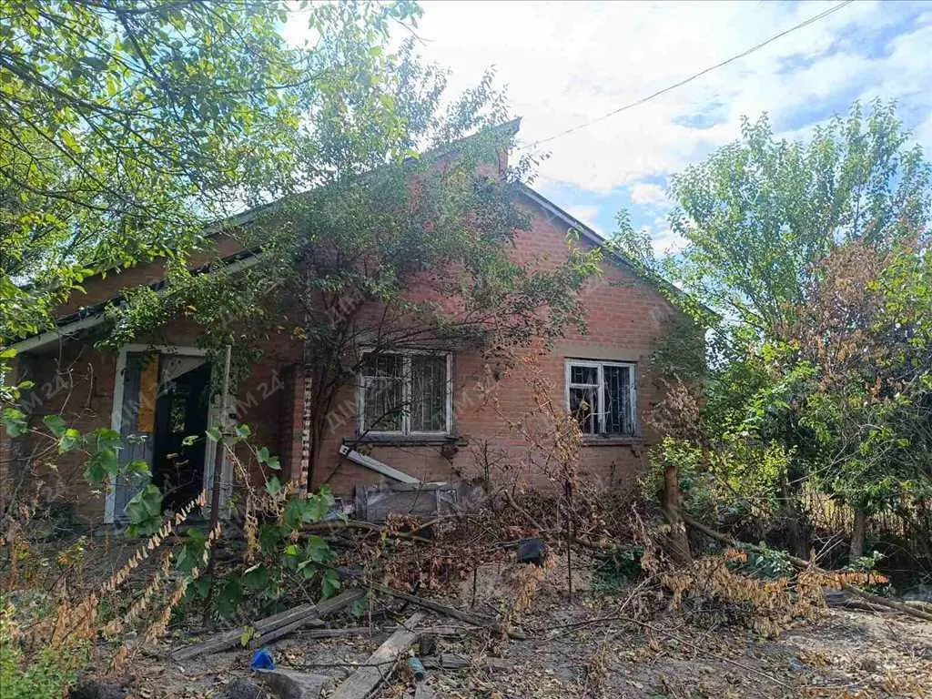 Цегляний будинок в Верхолах