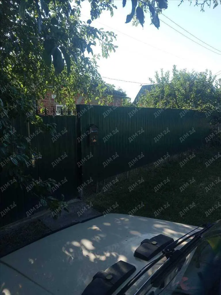 Будинок із земельною ділянкою в центрі Диканьки