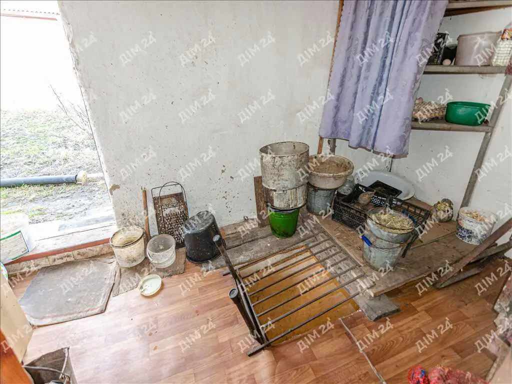 Будинок з господарськими спорудами у Решетилівці