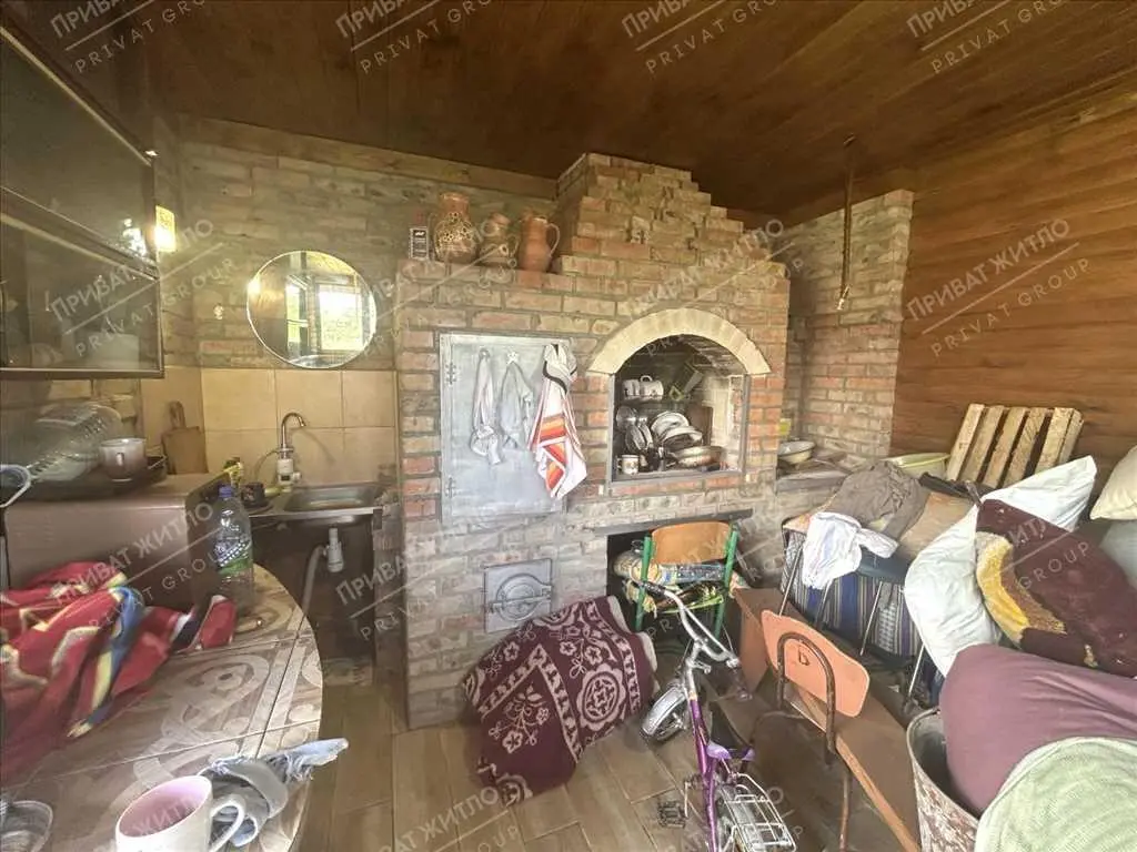 Затишний будинок з ділянкою в передмісті Полтави