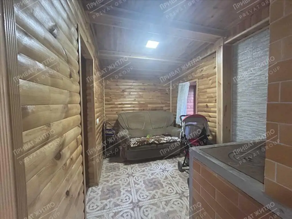 Затишний будинок з ділянкою в передмісті Полтави