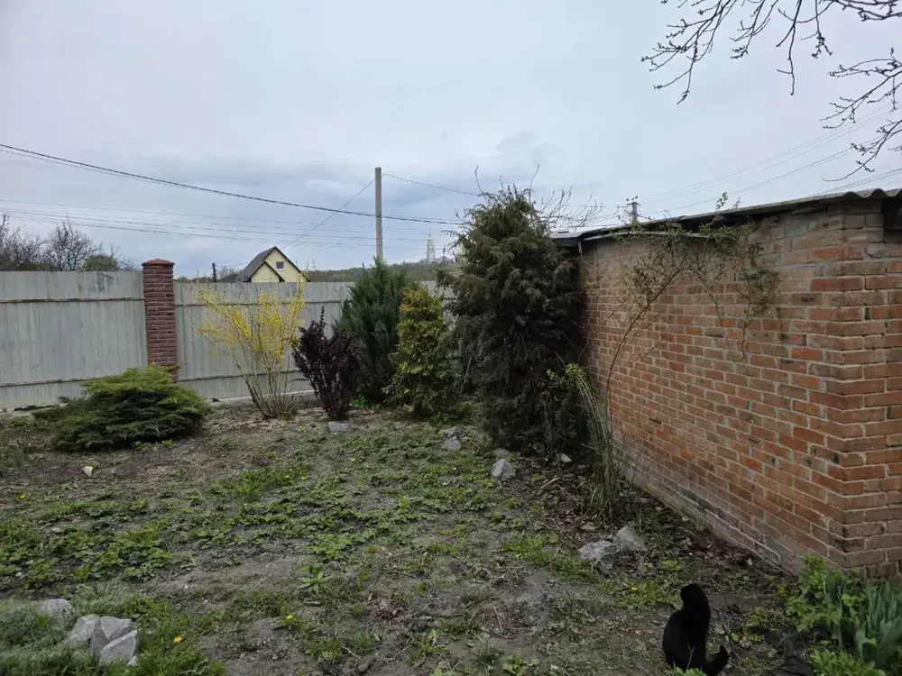 Комфортне житло в центрі: окремий двір + гараж